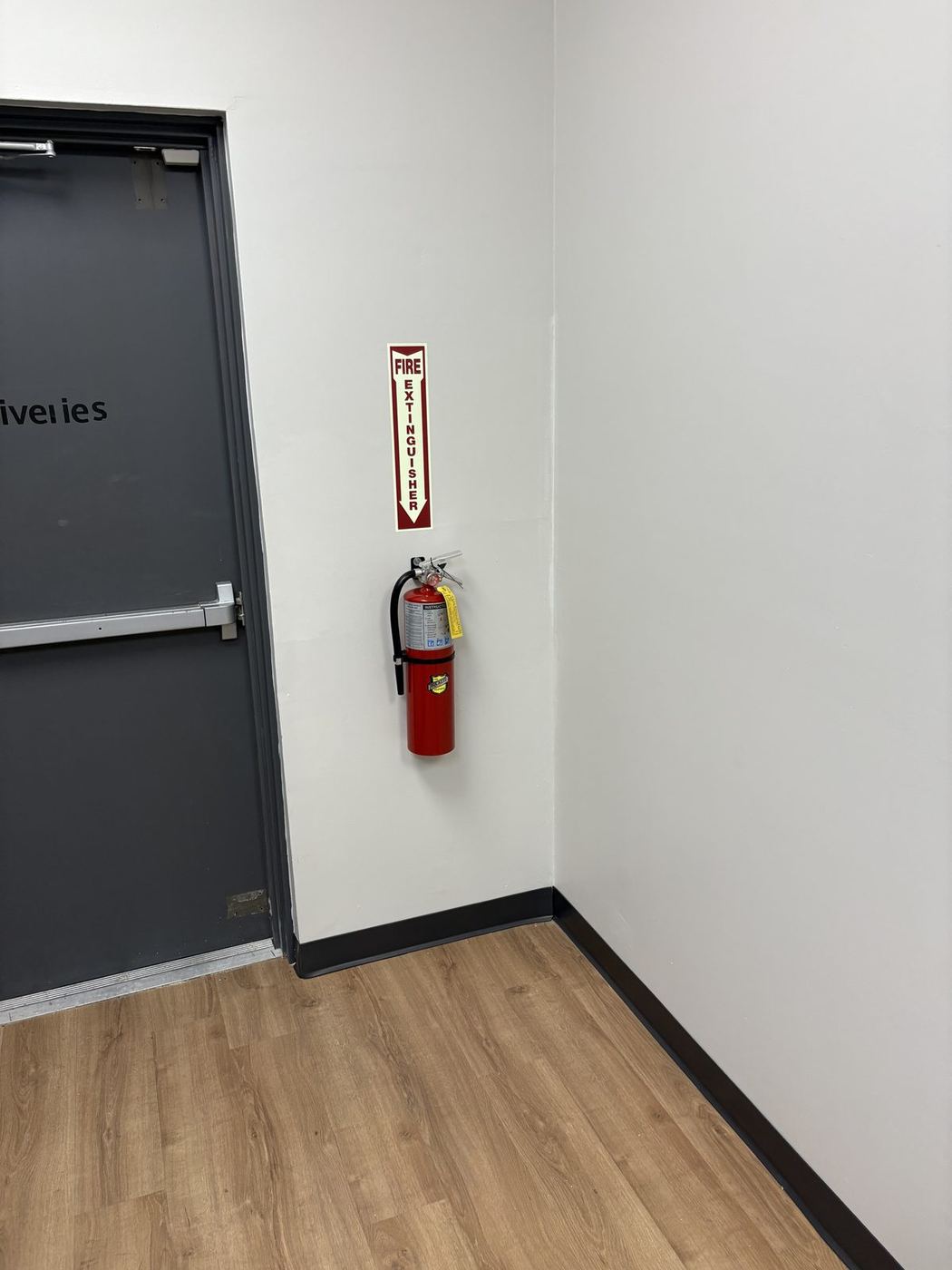 Electrical and data for a UPS Store upfit: finished back corridor with the rear deliveries door
